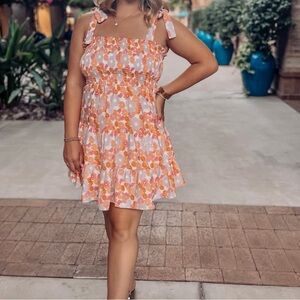 Pink Lily Floral Smocked Dress in Orange and Purple